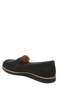 Classic tailoring meets modern design in this sport-inspired loafer. 0.75" heel Round toe Slip-on style Cushioned footbed White sole PU upper, synthetic sole Imported Black Flats With Arch Support For Spring, Black Synthetic Flats With Arch Support, Black Flat Slip-ons With Arch Support, Synthetic Loafers With Arch Support For Work, Flat Synthetic Loafers With Arch Support, Workwear Synthetic Loafers With Arch Support, Slip-on Loafers With Arch Support For Work, Workwear Slip-on Loafers With Arch Support, Black Flats With Arch Support And Round Toe