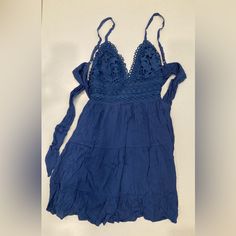 Brand: Dressy Girl Size: Small Description: Lauren Flowy Dress ( Blue) Open Back. Tie At The Back. Never Worn. Vacation Blue Dress With Lace Trim, Vacation Blue Dresses With Lace Trim, Blue Lace Trim Dress For Vacation, Blue Summer Dress With Lace Trim, Blue Lace Trim Beach Dress, Blue Lace Trim Dress For Day Out, Blue Mini Dress With Lace Trim For Vacation, Blue Mini Dress With Spaghetti Straps For Vacation, Blue Spaghetti Strap Mini Dress For Vacation