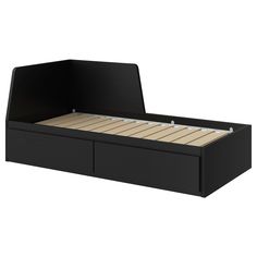 a black bed with two drawers on the bottom and one drawer open to reveal a mattress