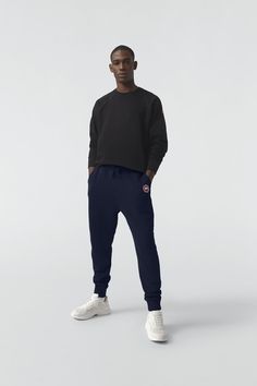 Made with 100% Cotton for breathability and comfort, the Huron Pant has a rib-knit waist and cuffs for a tailored fit and a zippered back pocket. Sporty Straight Leg Joggers With Ribbed Cuffs, Athleisure Trousers With Ribbed Cuffs, Sporty Tapered Leg Pants With Ribbed Cuffs, Navy Casual Pants For Business Casual, Athleisure Straight Leg Bottoms With Ribbed Cuffs, Athleisure Pants With Ribbed Cuffs For Everyday, Casual Bottoms With Ribbed Cuffs And Straight Hem, Tapered Leg Sweatpants With Ribbed Cuffs, Everyday Athleisure Pants With Ribbed Cuffs