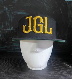 This snapback is a great gift for yourself or someone else, it is embroidered and very good quality! If you have any questions feel free to contact me! Black Adjustable Fitted Hat With Embroidered Logo, Adjustable Black Fitted Hat With Embroidered Logo, Black Snapback Baseball Cap With Letter Print, Black Hats With Letter Print For Gifts, Black Hats With Letter Print As Gifts, Black Fitted Hat With Letter Print And Flat Brim, Snapback Baseball Cap With Embroidered Logo As Gift, Custom Black Snapback Hat With Curved Brim, Black Snapback Hat With Letter Print And Flat Brim