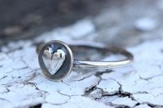 Sterling Silver Stacking Ring Heart Ring Sterling Silver Stacking Rings Stackable Rings for Women Sterling Silver Ring Silver Rings Heart This listing is for one sterling silver rustic heart stacking band. This ring is 100% made by me using sterling silver sheet and wire. These super cute rings are elegant and bohemian at once. Wear it alone or with other stacking rings. I love wearing my stacking set on my thumb to compliment other beautiful rings on my other fingers. The combinations are endle Everyday Stackable Heart Ring, Stackable Everyday Heart Ring, Simple Heart-shaped Promise Ring, Silver Stackable Heart-shaped Ring, Adjustable Heart Shaped Stackable Rings For Everyday, Adjustable Heart Ring For Everyday, Delicate Heart-shaped Silver Rings, Tiny Heart-shaped Ring For Anniversary, Silver Heart Ring For Everyday Wear