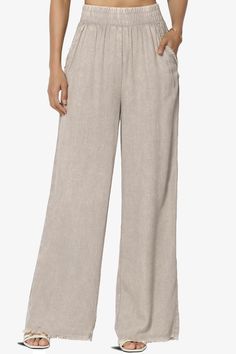 Discover the perfect blend of boho-chic and comfort with these Washed Linen Wide Leg Pants.Their elastic waistband and frayed hem offer a relaxed, yet stylish fit that moves with you.Crafted from a breathable linen blend, these versatile slacks are a must-have for effortless summer style.Dress them up for work or keep it casual for a weekend getaway. With slant pockets for convenience and a timeless wide-leg design, these full-length pants are ideal for every occasion.Trendy Wide Leg Pants: Capt Relaxed Pull-on Ankle-length Pants, Wide Leg Ankle-length Pants For Vacation, Casual Straight Leg Pants With Bottom Hem, Spring Beige Wide Leg Pants With Pull-on Style, Bohemian Pull-on Style Bottoms For Spring, Comfortable Beige Bottoms With Elastic Waistband, Solid Bohemian Bottoms For Spring, Bohemian Relaxed Fit Bottoms For Day Out, Comfortable Beige Bottoms For Spring