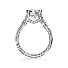 This immaculate Michael M engagement ring is displayed with a stunning round shaped center diamond (not included at time of purchase), and can fit an array of diamonds ranging in size from 1.25 carats to 1.75 carats.This Michael M engagement ring is immaculately adorned with over 0.86 carats total weight of breathtaking round cut side diamonds. Total Carat Weight: 0.86ctw - Not including center diamond. Available in White, Rose Gold, Yellow Gold and Platinum.Prices may vary. Contact us for more Modern Moissanite Wedding Ring With Center Stone, Modern Cubic Zirconia Wedding Ring Round Cut, Timeless Moissanite Wedding Ring With Brilliant Cut, Classic Brilliant Cut Halo Ring For Proposal, Modern Diamond Ring With Prong Setting For Proposal, Modern Moissanite Wedding Ring With Brilliant Cut, Timeless Round Cut Cubic Zirconia Wedding Ring, Timeless Halo Ring For Proposal With Brilliant Cut, Timeless Diamond Wedding Ring With Brilliant Cut