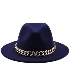 Accessorize any outfit with our most loved fashion fedora. Make heads turn in these. Size : 15.7" X 14.6" Material : 65% Polyester, 35% Cotton Chain Pointed Solid Panama Hat﻿Preorder only, item will ship on or around Jan 20th 2022. Once a Preorder has been placed it cannot be modified or cancelled. Tracking information will be emailed to customers when orders ship. Trendy Adjustable Fedora With Flat Crown, Trendy Adjustable Hat With Chain Detail, Trendy Adjustable Hats With Chain Detail, Trendy Adjustable Hat With Chain, Party Fedora With Adjustable Flat Crown, Trendy Flat Brim Felt Hat For Party, Trendy Hat Bands For Summer Parties, Trendy Adjustable Blue Fedora, Adjustable Flat Crown Fedora For Party