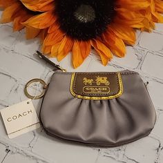 Coach Silver Satin And Leather Amda Coin Puse. Nwt. Measures 5" X 4" . Large Coach Emblem In Gold On Tan Leather And Gold Trim. Gold Toned Key Ring Attached. Mini Coin Purse, Pink Wristlet, Canvas Wallet, Coach New York, Bags Coach, Ring Color, Zip Wallet, Diamond Quilt, Coach Leather