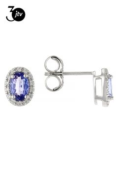 0.86ctw Oval Tanzanite with 0.21ctw Round White Zircon Rhodium Over Sterling Silver Earrings. Measures Approximately 0.35"L x 0.27"W. Push Backings. Accent Stones Primarily Zircon. Silver Oval Diamond Earrings With Gemstone, Silver Oval Halo Diamond Earrings, Sterling Silver Oval Diamond Earrings With Halo Design, Oval Sterling Silver Diamond Earrings With Halo Design, Blue Tanzanite, Sterling Silver Earrings, Silver Earrings, Sterling Silver, Stone