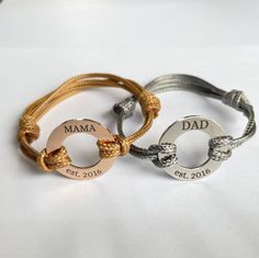 "This bracelet is a perfect gift for mum and dad or mum and dad to be. Also can be a couples bracelet.  You can choose any words you like on the bracelet with a maximum of 3-4 words (depending how long they are).  The bracelet is adjustable. The plate's diameter measures at  20 mm. Made of stainless steel and waxed cord.  Waterproof. Non tarnish.  For personalisation please leave a \"note to seller\" or if you forget about it at checkout just message us.  If you have any other request, please me Dad Bracelet, Family Bracelet, Bracelet Couples, Family Bracelets, Dad To Be, Mum To Be, Personalised Necklace, Couples Bracelet, Gift For Mum