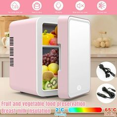 a pink mini fridge with fruit and vegetables in it