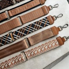 - High-quality fabric strap - Leather back made of genuine leather - Stable carabiner - Clasp in gold or silver - Handmade Branding - Max. length 130 cm - Width 5cm Leather Bag Strap With Logo For Everyday, Leather Bag Strap With Logo For Travel, Leather Bag Strap With Logo For Daily Use, Leather Travel Bag Strap With Logo, Trendy Leather Bag Strap With Logo, Luxury Rectangular Shoulder Strap For Daily Use, Brown Detachable Shoulder Strap For Daily Use, Leather Bag Strap With Logo, Leather Logo Strap For Bag