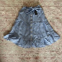 Polo Ralph Lauren Blue/White Checkered Linen Skirt Size 2. Two Side Pockets. New With Tags! Gingham Skirt For Day Out In Spring, Light Blue Cotton Skirt For Vacation, Spring Gingham Skirt For Day Out, Light Blue Midi Skirt For Summer, Spring Gingham Ruffled Skirt, Summer Gingham Lined Skirt, Casual Gingham Mini Skirt For Summer, Summer Gingham Ruffled Skirt Bottoms, Summer Gingham Ruffled Skirt