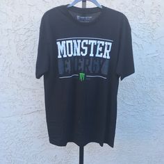 Monster Energy T-Shirt, Nwot Black Fan Merchandise T-shirt With Branding, Black Branded T-shirt For Fan Merchandise, Black Tops For Fan Merchandise With Branding, Black Branded Tops For Fan Merchandise, Black Tops For Fan Merchandise, Monster Energy, Black Green, Tee Shirts, Mens Shirts