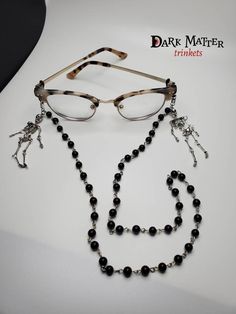 - Handmade item. - Ships from Florida. - Elegant eyeglasses chain with 6mm of agate stones.  - It's secure to use around your neck. - Satisfying to wear. - We may accept special requests.  - Adjustable Rubber Spectacle end Connectors.  - Lobster Claw in the ends. -Since it's a handmade item, an error of 1 to 2 cm can occur. - Very well wrapped. - Please feel free to email me with any questions or concerns.  - Share your pictures using the eyeglass chain, I would appreciate seeing it. 🖤 Elegant Black Metal Glasses Chains, Black Metal Glasses Chains With Adjustable Chain, Black Metal Glasses Chain With Adjustable Feature, Black Metal Glasses Chain With Adjustable Length, Black Metal Adjustable Glasses Chain, Adjustable Black Metal Glasses Chains, Metal Beaded Glasses Chains For Gifts, Metal Beaded Glasses Chains As Gift, Beaded Metal Glasses Chains As Gift