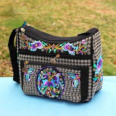 New Ethnic Style Women's Embroidery Bag Large Capacity Multi layer Embroidery One shoulder Crossbody Cosmetic Bag Size: 21CM * 11CM * 16CM Bohemian Shoulder Bag With Multicolor Embroidery And Motifs, Bohemian Multicolor Shoulder Bag With Floral Embroidery, Luxury Bohemian Multicolor Embroidery Shoulder Bag, Folk Style Embroidered Multicolor Shoulder Bag, Travel-ready Multicolor Embroidered Hobo Shoulder Bag, Money Flowers, Two Piece Jumpsuit, Embroidery Bags, Backpack Sport