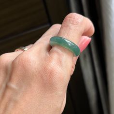 Description --------------------------------- The jade ring is 100% natural, untreated and undyed Type-A jadeite jade and is 100% handmade. Translucent uniform deep forest bluish green, purely created by our Mother Nature makes this bangle ring and beautiful. The sense of touch is cool. Wearing a jadeite ring symbolizes to have a peaceful life and keep you from evil spirits. It also helps to enhance longevity and luck. This ring is deserved to be addition to your collection or as a gift to someone special. **Note** There is no flaws in the ring.  ######Kindly feel free to contact us for more photos or with any questions prior to your checkout. We are always happy to answer all your questions.######  Identification Inner Diameter -- 17.2 mm Thickness -- 3.8 mm Width -- 6.1 mm Weight -- 4.2 Unique Jade Gemstone Ring, Jade Gemstone Rings For Healing, Oval Jade Ring With Natural Stones, Handmade Green Chalcedony Rings, Green Crystal Ring With Natural Stones, Green Jade Rings With Natural Stones, Unique Round Jade Ring, Spiritual Jade Gemstone Rings, Unique Oval Jade Rings