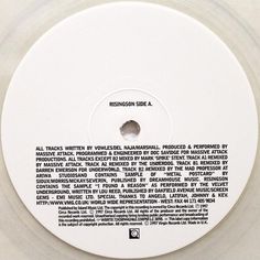 a white disc with black writing on it