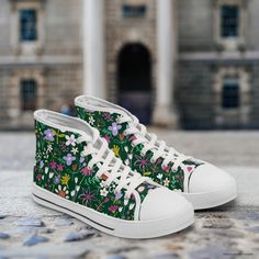 This pretty spring meadow pattern was designed by me and is only available on these shoes!  Made with breathable polyester canvas and featuring hi-poly deodorant memory foam insoles, these women's high top sneakers bear all the marks of an awesome shoe.   .: Breathable polyester canvas .: Hi-poly deodorant memory foam insoles .: EVA shock-absorbing layer .: Durable rubber outsole .: White decoration Original design by chelsea__designs, me! Spring High-top Sneakers For Streetwear With Speckled Midsole, Spring Streetwear High-top Sneakers With Speckled Midsole, High-top Sneakers With Speckled Midsole For Spring Streetwear, Casual High-top Sneakers For Spring, Spring High-top Sneakers With Laces, Spring High-top Sneakers With Rubber Sole And Round Toe, Casual High-top Sneakers With White Sole For Spring, Spring High-top Canvas Shoes For Streetwear, Green Canvas Shoes With Round Toe For Summer