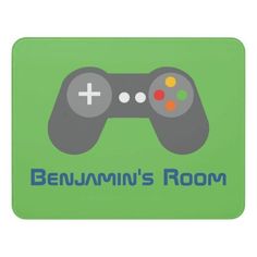 a game controller with the words benjunn's room in blue and green