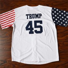 a baseball jersey with the number 45 on it and an american flag in the back