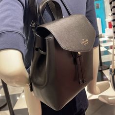 Kate Spade Lizzie Medium Flap Backpack Black Color: Black Details 9.5"H X 9.75"W X 4.5"D Handle Drop: 3" Saffiano 100% Leather Metal Pinmount Logo Two Way Spade Jacquard Lining Interior: Front Slip & Back Zip Pocket Flap With Magnetic Snap & Drawstring Closure Dust Bag Not Included Imported Style #Wkr00345 Elegant Black Backpack With Detachable Strap, Kate Spade Backpack With Detachable Strap For Errands, Kate Spade Black Backpack With Removable Pouch, Kate Spade Black Backpack With Detachable Strap, Kate Spade Black Backpack For Errands, Kate Spade Black Everyday Backpack, Chic Kate Spade Backpack For Errands, Elegant Kate Spade Backpack For Errands, Kate Spade Black Backpack For On-the-go