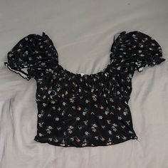 Urban Outfitters Black Floral Top With Puffy Sleeves And Pretty, Feminine Ruching Design And Lightweight Material Size Women’s Medium New With Tags Urban Outfitters Fitted Floral Print Tops, Fitted Floral Print Top From Urban Outfitters, Fitted Floral Print Tops By Urban Outfitters, Fitted Urban Outfitters Floral Print Tops, Fitted Black Blouse For Summer, Black Stretch Tops With Floral Print, Black Stretch Top With Floral Print, Black Floral Print Stretch Tops, Black Stretch Floral Print Tops