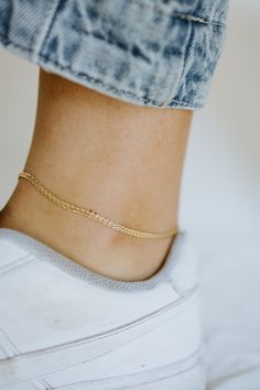 Step into everyday elegance with our stunning 18k gold-filled braided chain anklet. Sleek, simple, and effortlessly stylish - the perfect accessory for any occasion. ✨ All anklets come in 10 inches, if you would like it sized smaller add your measurment in the notes section of your order. Keep in mind when requesting a custom size - you do not want your anklet too tight, add half an inch for a looser fit.  ∙ C H A I N ∙ D E T A I L S ∙ - 18k Gold Filled Chain - 18k Gold Filled Findings - 10 inch Adjustable Gold Plated Anklets, Gold Tarnish Resistant Anklets For Gifts, Dainty Jewelry With Curb Chain, Gold Anklet With Adjustable Chain For Gift, Gold Anklets With Delicate Chain For Gift, Gold Anklets With Delicate Chain As Gift, Delicate Gold Chain Anklets As Gift, Gold Delicate Anklet For Gift, Elegant Adjustable 14k Gold-filled Anklets