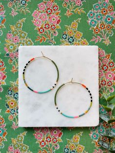 "This special collection focuses on color and pattern that will coordinate with any wardrobe. Tiny Miyuki glass beads were carefully chosen to give a variety of texture to this weightless hoop earring design.  The japanese glass beads, used. in every beaded hoop design we offer, are a world standard for their high quality, brilliance, and uniform shape.  If you love to accessorize, then don't delay! These were made for you! Choose from two sizes: Medium 35mm (1.38\") or Large 45mm (1.75\") round weightless gold filled hoops. Great for every day wearability. We aim to ship 2-3 times a week, and often have your purchase in the mail to you in less than 24 hours. Each purchase includes a gift box or cotton jewelry pouch. We recommend the following Care: - store your clean, dry jewelry in a box Pie In The Sky, Cotton Jewelry, Sweet Jewelry, Get It Girl, Hoop Design, Gold Filled Hoops, Beaded Hoop Earrings, Jewelry Earrings Hoops, Jewelry Pouch