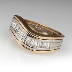 two gold and silver rings with diamonds on them