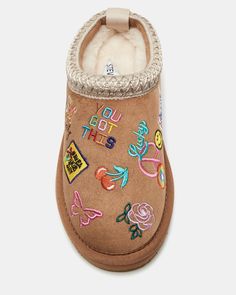 The kids' SELENA is a must-have for any child's wardrobe. These slip-on flats not only offer comfort with their cozy faux fur, but they also add a pop of color with their vibrant multi-colored patches. Perfect for any occasion, these shoes are sure to be a favorite for your little one. .75 inch heel height Microsuede upper material Microsuede lining Faux fur sock Synthetic sole Imported Pop Of Color, Dress Sandals, Dress With Boots, Multi Colored, Cognac, Little One, Kids Shoes, Faux Fur, Shoes Mens