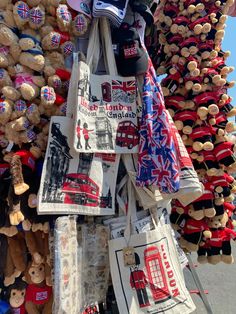 many stuffed animals are on display for sale