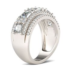 a white gold ring with three rows of diamonds