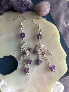 Beautiful chandelier earrings featuring amethyst, moonstone beads and amethyst star beads. Sterling silver ear wires. Star Beads, Diy Jewelry Unique, Jewelry Making Earrings, Making Earrings, Moonstone Beads, Beautiful Chandelier, Jewelry Unique, Chandelier Earrings, Jewelry Ideas