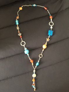 long orange and turquoise ethnic long necklace with glass beads, metal, semi-precious stones, wood of different shapes Metal Necklace, Necklace Turquoise, Orange And Turquoise, Semi Precious Stones, Metal Necklaces, Different Shapes, Long Necklace, Semiprecious Stones, Precious Stones