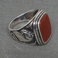 Impressive High- Quality Crafted Ring, Made Of 925 Sterling Silver Set With Natural Red Agate Stone. Metal Purity: Solid 925 Sterling Silver Stone Type: Natural Agate Stone Size: 18mm X 13mm Total Weight: 13.5g. Size: 11.5 Size Can Be Adjusted Up. Included: Silver & Gold Polishing Cloth With Lasting Shine. Classic Carnelian Jewelry Hallmarked, Red Carnelian Signet Ring For Anniversary, Classic Carnelian Ring Jewelry, Formal Red Carnelian Signet Ring, Classic Carnelian Ring, Silver Carnelian Ring As A Gift, Silver Carnelian Rings For Gift, Classic Red Agate Jewelry, Silver Carnelian Ring Jewelry