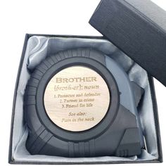 a wooden watch in a gift box with the words brother on it's side