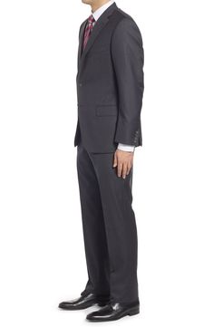 Finely textured wool enriches a handsome suit featuring flat-front trousers paired with a two-button, notched-lapel jacket. Jacket has notched lapels; nonfunctional four-button cuffs Jacket is lined; trousers are lined to the knee 100% wool Dry clean Made in Canada Modern Notch Lapel Pantsuit For Formal Occasions, Timeless Notch Lapel Pantsuit For Formal Occasions, Classic Formal Pantsuit With Flat Front, Timeless Notch Lapel Suits For Business Trips, Modern Business Suits With Flat Front, Modern Business Suit With Flat Front, Classic Business Pantsuit With Concealed Placket, Formal Wool Pantsuit With Pressed Crease, Timeless Business Pantsuit With Hidden Buttons