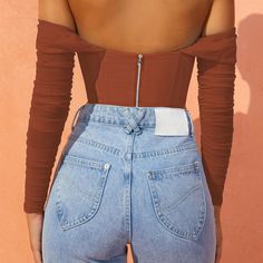 Get ready to show if off in our statement corset crop top. The strong structured bodice cinches you in whilst the underwired cups and shaped hemline give a bust-flattering and figure framing fit. We can't forget the dreamy mesh sleeves and overlay detailing that complete this must-have top. Summer date night ready. babe. Exposed zipper on reverse Tight. figure-hugging fit Stretch mesh Summer Date Night, Lantern Sleeve Sweater, Mesh Corset, Black Brick, Strapless Bandeau, Corset Crop Top, Corsets And Bustiers, Black Swimwear, Mesh Sleeves