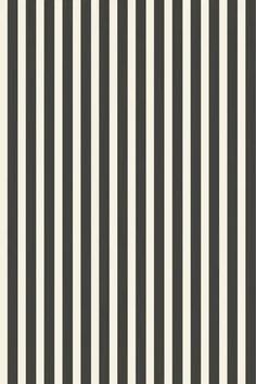 a black and white striped wallpaper with vertical lines on the bottom half of it