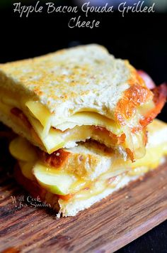 an apple and bacon quesadilla grilled cheese sandwich on a cutting board