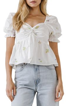 Colorful embroidered flowers bring delicate charm to a graceful babydoll top framed by ruffled puff sleeves and a sweetheart neck. Sweetheart neck Short sleeves Lined 100% cotton Hand wash, dry flat Imported Floral Embroidery Top, Color Embroidery, English Factory, Floral Embroidered Top, Embroidery Top, Babydoll Top, Puff Sleeve Top, Sweetheart Neck, Women Clothing Boutique