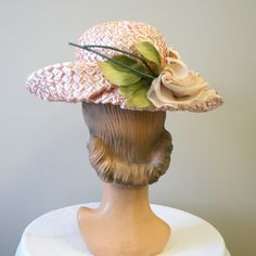 "Vintage 1960s pink straw hat, with a pink millinery rose on the back, as well as an organza and velvet band.  Made by Mr. John Jr.  In fair condition, with no holes or stains, but it is a little yellowed overall from age.  It has a 4.5\" wide brim, a 5\" tall crown, and an interior circumference of 19.5\". ---> If you need an order shipped by a particular date or shipped via a quicker method, please ask PRIOR to purchase to see if we can accommodate that request. Visit the rest of our shop for Vintage Mini Hats For Formal Summer Events, Vintage Mini Hats For Summer Formal, Vintage Mini Hats For Summer Formals, Vintage Summer Mini Hats For Formal Occasions, Vintage Formal Mini Hats For Summer, Vintage Formal Mini Hats For Spring, Pink Fitted Straw Hat For Garden Party, Vintage Straw Hat For Royal Ascot Garden Party, Vintage Formal Hat For Spring