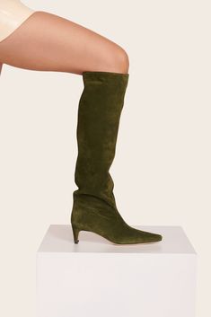 The Wally is a slouchy, suede knee-high boot featuring a pointed toe and a slim heel design. Suede Boots Knee High, Heel Design, Slouched Boots, Wedge Sneakers, Green Suede, Handbag Shoes, Designer Heels, Sandals Summer, Suede Boots