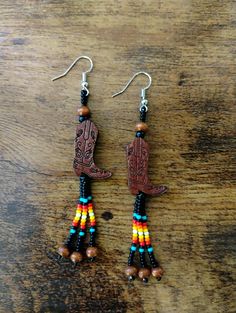 Black and brown cowboy boot fringe earrings Brown Fringe Tassel Earrings For Festivals, Brown Tassel Earrings For Festivals, Brown Fringe Jewelry For Festivals, Southwestern Fringe Earrings For Festivals, Southwestern Brown Concho Earrings, Adjustable Brown Earrings With Beaded Fringe, Southwestern Style Brown Concho Earrings, Brown Fringe Dangle Beaded Earrings, Brown Beaded Fringe Dangle Earrings