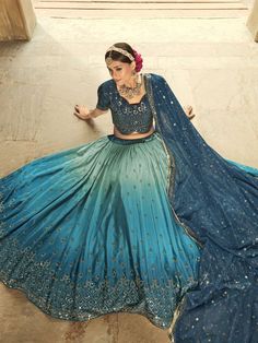 Buy superior blue and teal silk festive lehenga choli online for celebrating upcoming diwali festival celebration. Shop this superior lehenga choli which comes with silk blouse and silk blouse. Luxury Turquoise Lehenga For Diwali, Luxury Blue Silk Choli, Festive Blue Art Silk Choli, Festive Blue Raw Silk Choli, Peacock Theme Lehenga, Peacock Blue Lehenga, Teal Lehenga, Turquoise Lehenga, Teal Green Lehenga