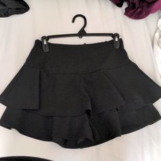 Ria Ruffle Skort In Black, Aus Size 10, Us Size 6 New With Tags Black Stretch Ruffle Skort, Black Ruffled Skirt Shorts For Summer, Summer Black Ruffled Skirt Shorts, Casual Ruffled Shorts For Night Out, Short Ruffle Bottoms For Night Out, Black Ruffled Skort For Party, Ruffled Short Bottoms For Night Out, Ruffled Bottoms For Night Out, Black Stretch Ruffled Skirt