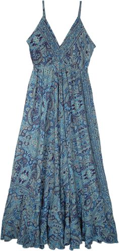 An effortless printed exquisite blue paisley print that dances gracefully across the fabric.  This print is a harmonious blend of different shades of blue, creating a visual masterpiece that's both captivating and soothing. #tlb #Sleeveless #vacationclothing #beachwrap #Floral #Printed #SilkDress #SareeSilkDress Blue Hippie Dress, Vintage Beach Dress, Blue Paisley Dress, Coastal Cowgirl Dress Outfit, Elegant Blue Paisley Print Dress, Spring Blue Paisley Print Dress, Blue Cotton Dress With Paisley Print, Summer Blue Paisley Print Dress, Blue Boho Dress