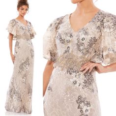 Brand: Mac Duggal Condition: New Floor Length V-Neck Gown With Dramatic Bell Sleeves, Lace Overlay, And Floral Bead-And-Sequin Embellishment Throughout. Mac Duggal Embellished Fabric (100% Polyester) Fully Lined V-Neck Short Bell Sleeve Embellished Waist Detailing Back Zipper Approx. 62.5" From Top Of Shoulder To Bottom Hem Available In Taupe Style #67842 V-neck Embellished Gown For Mother Of The Bride, Sequin V-neck Evening Dress For Mother Of The Bride, Festive V-neck Evening Gown, Embellished V-neck Evening Dress For Gala, Glamorous V-neck Mother Of The Bride Formal Dress, Glamorous Formal Mother Of The Bride Dress V-neck, Glamorous Formal V-neck Mother Of The Bride Dress, Champagne V-neck Gown With Sequins, Fitted V-neck Gown For Festive Occasions