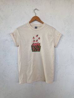 "Hand Printed and Hand Drawn! This is a 100% cotton screen printed t shirt with a hand drawn basket of tomatoes. It's perfect for summer! The shirts shown here are natural and are printed in red and green ink. // PROCESS: All of our items are individually hand printed by either me or my dad, which can lead to slight variations in placement. The ink is heat cured and will not fade over time. Since our items are printed to order, there is a 1-2 week processing time before shipping. If you absolute Screen Printing Shirts, Garden Gifts, Fashion Company, Shirt Outfit, Graphic Shirts, Print T Shirt, Screen Printing, Colorful Shirts, Graphic Tees