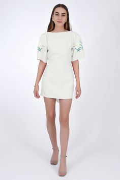 This Mini Shortsleeve 100% Linen Dress is the epitome of style, featuring a deep V open back with a belt that ties into a showstopping bow. Made to Measure. Fanm Mon garments are consciously crafted for your most delightful moments. Each piece is made-to-order by our team of experienced artisans. Chic Mini Dress With Floral Embroidery And Short Sleeves, Chic Short Sleeve Mini Dress With Floral Embroidery, Chic Short Sleeve Floral Embroidered Dress, Knee-length Embroidered Dress For Formal Summer Occasions, Formal Embroidered Knee-length Dress For Summer, Chic Short Sleeve Embroidered Summer Dress, Chic Fitted Embroidered Dress With Short Sleeves, Fitted Mini Dress With Boat Neck For Spring, Chic Fitted Short Sleeve Embroidered Dress