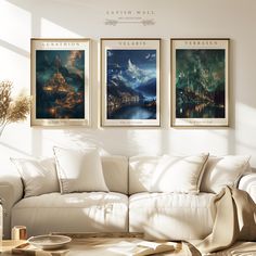 three paintings hang on the wall above a couch in a living room with white furniture